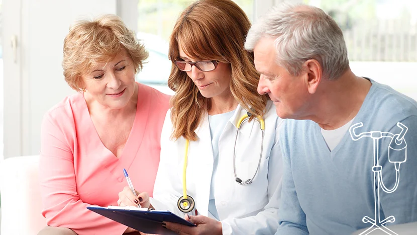 un médecin montrant quelque chose à un patient sur une tablette